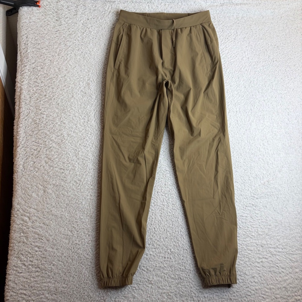 Lululemon Mens Surge Jogger Tan Brown Athletic Pants Zipper Cuffs Size M